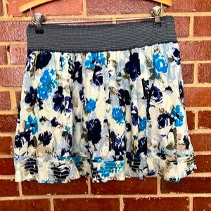 Charlotte Russe blue floral print mini skirt, size large.
